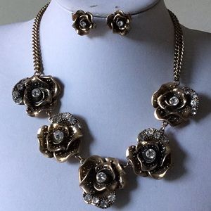 Antique look gold tone floral necklace earring set